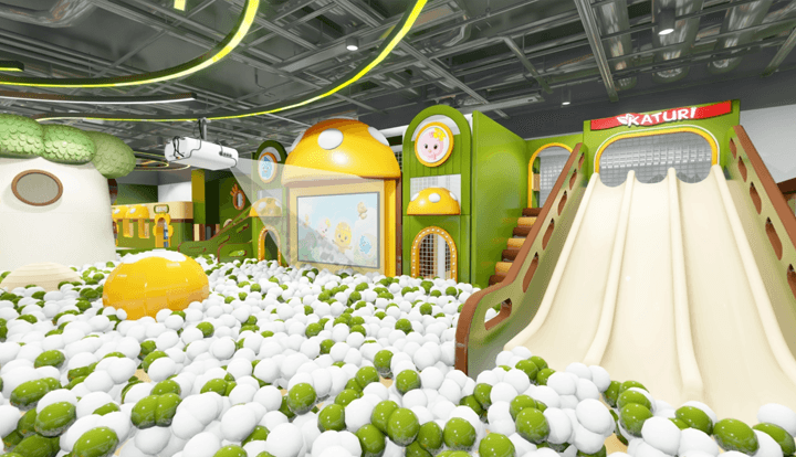 Green and yellow mushroom themed ball pit with three slides