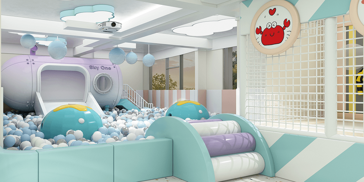 Bright indoor play area with a purple slide, colorful ball pit, playful crab-themed wall decorations, and soft foam climbing structures.