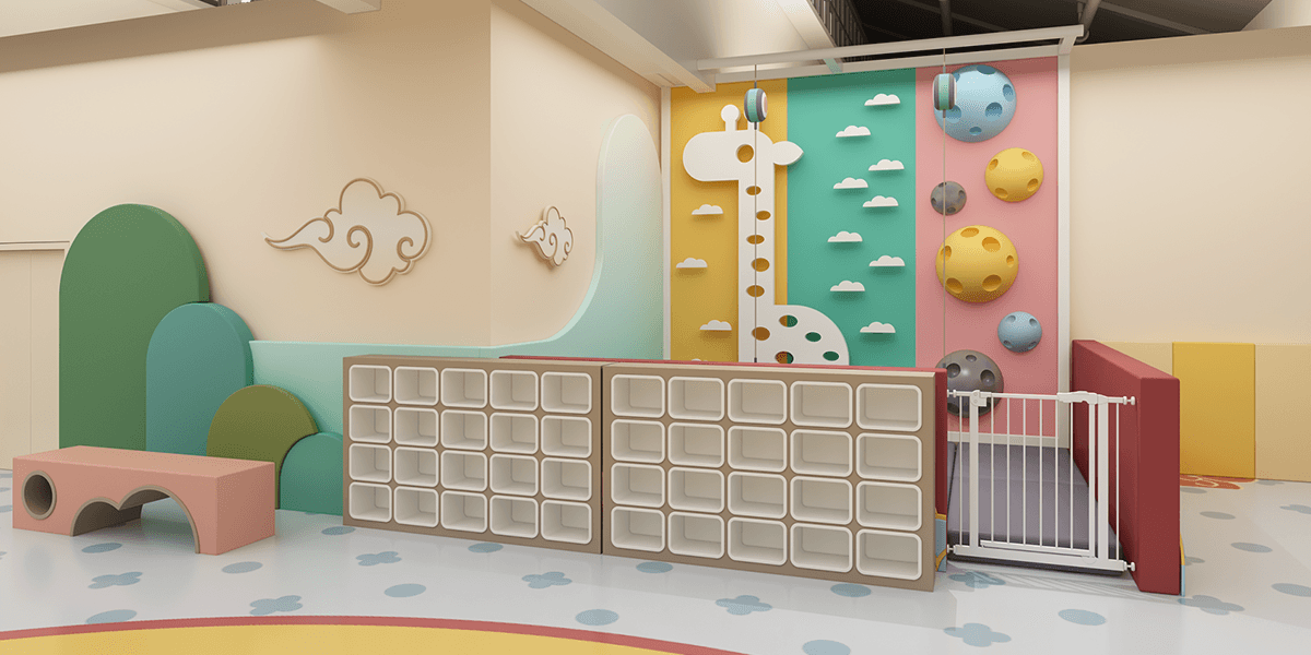 Colorful play area with a climbing wall featuring giraffe and cloud designs, soft curved seating, and storage cubicles.