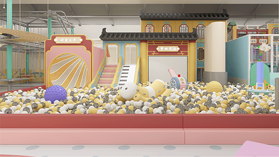 Colorful children’s indoor play area with soft play equipment and ball pit.