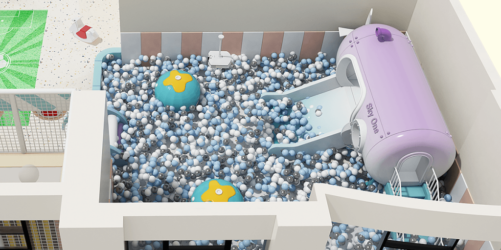 Bird's eye view of a play area with a ball pit, two colorful ball-shaped toys, and a purple slide leading into the pit.